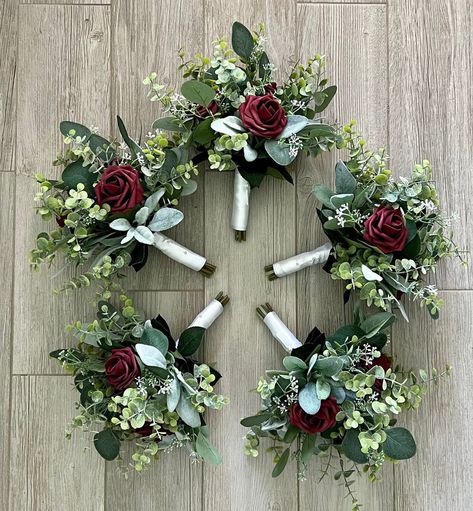 "Boho bridesmaids bouquets burgundy rose greenery bridal bouquet eucalyptus wedding bouquet, Lambs ear sage wine merlot bridesmaid flowers 🌿As Shown; Bridal 11-12\" 6 roses and heavy greenery  🌿 5 Bridesmaid 8\" 3 roses & greenery (shown) ( pictured are a set of 5 bridesmaids stem wrap is burlap)  If you would like a different color rose in the bouquets choose from color options shown in the photograph I added, just let me know in the personalization box. Only one color per item because the br Burgundy White Greenery Wedding, Simple Bridesmaid Bouquets Burgundy, Sage Green And Burgundy Wedding Flowers, Wine Red Wedding Bouquet, Wine Colored Wedding Flowers, Olive Green And Wine Red Wedding, Wine Red And Sage Green Wedding, Wine Color Bouquet, Maroon Pink And Green Wedding