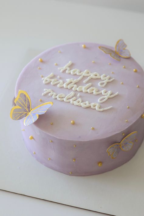 Lavender buttercream cake with gold Pearl sprinkles and paper butterflies. Cake Designs With Butterflies, Mini Butterfly Cake, Simple Butterfly Cake Designs, Butterfly Cake Ideas Birthdays Simple, Butterfly Bento Cake, Simple Pastel Cake, Simple Cute Birthday Cakes, Cute Mini Cakes Birthdays, Cute Purple Cake