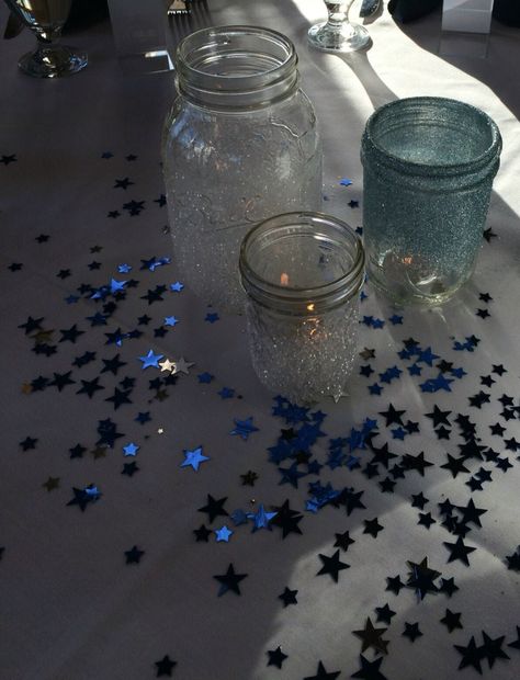 Sparkle Mason Jar Centerpieces for Starry Night or Night under the Stars Theme Night Under The Stars Theme, Prom Themes Starry Night, Sparkle Mason Jars, Under The Stars Theme, Starry Night Prom, Night To Shine, Galaxy Wedding, Sweet 16 Themes, Night Under The Stars