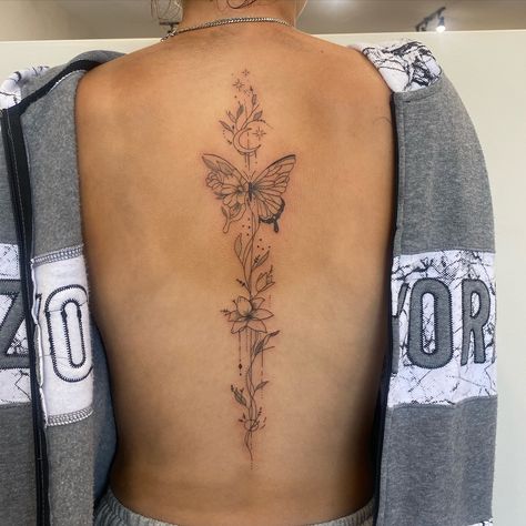 Big spine piece but make it dainty and cute ✨ #daintyspinetattoo #femininespinetattoo #girlyspinetatoo #finelinespinetattoo #finelinetattooinspo Women Tattoo Back Spine, Big Dainty Tattoos For Women, Spine Tattoos For Women Baddie, Back Tattoo Women Sun And Moon, Simplistic Spine Tattoos For Women, Spine Tattoos On Women, Vertical Tattoos For Women Back, Western Style Spine Tattoos, January Birth Flower Spine Tattoo