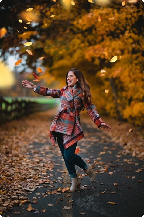 Woman in plaid fall coat tossing leaves Get Prettier, Autumn Photography Portrait, Australia Pictures, Fall Coats, Autumn Woman, Fall Portraits, Tongue Tie, Stylish Photo Pose, Fall Photoshoot