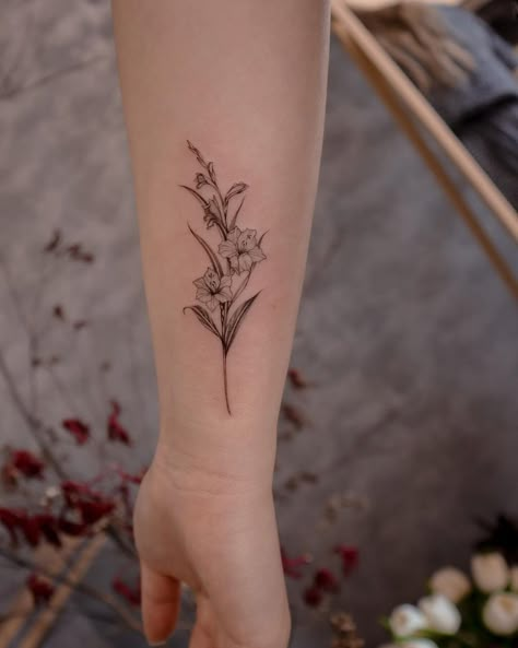 Forearm Daffodil Tattoo, Marigold And Gladiolus Flower Tattoo, Daffodil Tattoo Forearm, Tattoo Inner Forearm Woman, Gladiolus And Aster Tattoo, Gladiola Tattoo Small, Gladiolus Flower Tattoo Design, Gladiolus Flower Drawing Simple, Gladiolus Flower Tattoo Small