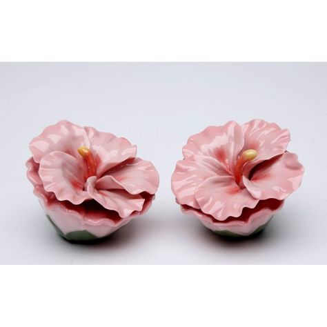 This exquisite set of ceramic Hibiscus Flower Salt and Pepper Shakers is perfect to adorn your home Decor be it in the kitchen or elsewhere. With delicate petals and a vivid hue its the ideal gift for your mom or a special someone and a tasteful statement piece for weddings. Redefine elegance with this one-of-a-kind piece. Salt And Pepper Mills, Pink Hibiscus, Salt And Pepper Grinders, Salt Shaker, Salt And Pepper Set, Hibiscus Flower, Gifts For Your Mom, Ceramic Flowers, Hibiscus Flowers