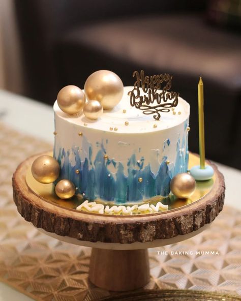 Bringing a touch of gold and elegance to birthday celebrations with this hand-painted blue and white abstract cake, adorned with golden spheres ✨🎂. Every detail, from the textured frosting to the personalized name, is made with love and care. 💙 #homebaker #cakeart #birthdaycakes #customcakes #goldcake #blueandgold #handpaintedcake #bakersofinstagram #cakesofinstagram #thebakingmumma Blue Gold Birthday Cake, Abstract Cake, Gold Birthday Cake, Hand Painted Cakes, Wedding Cakes Blue, Blue Cakes, Gold Cake, Elegant Cakes, Gold Birthday