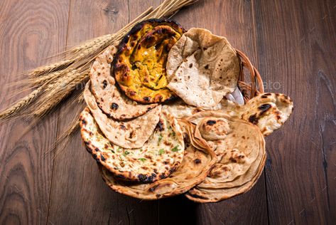 Indian Bread Basket by stockimagefactory. Assorted Indian Bread Basket includes Chapati, Tandoori Roti, Naan, Paratha, Kulcha, Missi Roti #Sponsored #stockimagefactory, #Assorted, #includes, #Indian Naan At Home, Missi Roti, Butter Naan, Tandoori Roti, Indian Dinner, Clay Oven, Vegetarian Curry, Indian Bread, Indian Kitchen