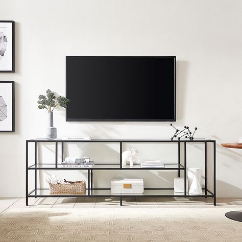 A must-have for living areas and entertainment spaces, this TV stand sets the stage for the big game, a movie marathon, or that season finale everyone’s been talking about. Crafted from steel, it strikes a clean-lined silhouette and boasts a metallic finish and glass shelves for a look that blends with nearly any color palette. Tv Regal, Metal Tv Stand, Glass Tv Stand, Tv Stand Set, Casa Country, Shelves Wall, Living Room Essentials, Rack Tv, Tempered Glass Shelves