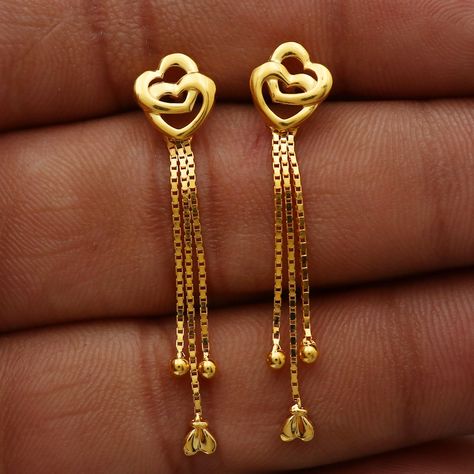 Beautiful yellow gold earrings jewelry from India, Best Wedding Handmade Jewelry for gift Metal- Yellow Gold Gold Purity- 22kt yellow Gold Weight - 2.28 grams approx Full Length - 3.8 cm approx Full Width - 0.8 cm approx more similar earrings - click the below link https://www.etsy.com/in-en/shop/morvijewels?ref=seller-platform-mcnav 2 Grams Gold Earrings, Gold Tops Earrings, 3 Grams Gold Earrings Indian, 2 Grams Gold Earrings Designs, Chain Tops, 22k Gold Earrings, Gold Earrings Indian, Ring Indian, Gold Ring For Women