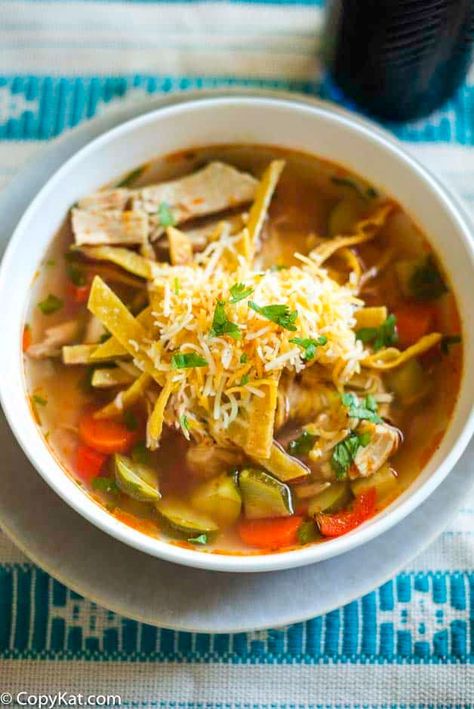 Enjoy a flavorful bowl of Chicken Tortilla Soup on a cold day. It's loaded with healthy vegetables, chile peppers, and Tex-Mex spices. Make it for dinner with this easy El Torito's copycat recipe. #souprecipe #souprecipeseasy #chickensoup #tortillasoup #copycat #copycatrecipes Creamy Chicken Tortilla Soup, Light Soups, Chicken Tortillas Soups Recipe, Fried Tortillas, Tortilla Soup Recipe, Copykat Recipes, Chicken Tortilla Soup, Chicken Tortilla, Tortilla Soup