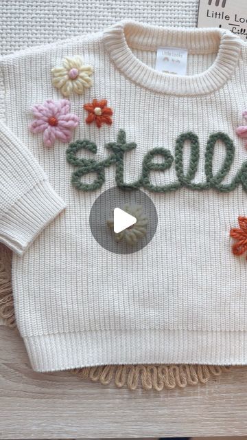 Little Looks by Lilly on Instagram: "Making the winning spring sweater design! What do we think?! I’m loving these colors together; chunky Sage for the name, extra chunky bubble, chunky moon, and chunky pumpkin for flowers! 🌸 you can order this exact design with your Little’s name today during our drop! 0-3m up to 2-4T available for this design #custom #handembroidery #sweater #littlelooksbylilly" Spring Sweater, Sweater Design, Embroidery Flowers, Hand Embroidery, Desi, Bubbles, Moon, Embroidery, Flowers