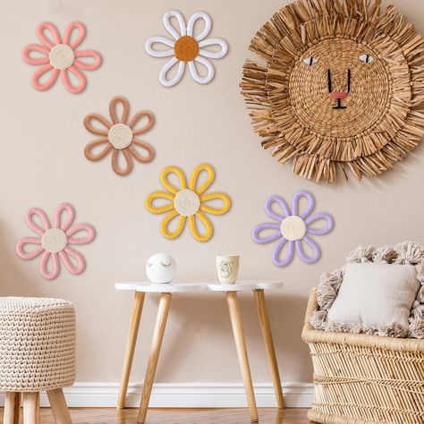 PRICES MAY VARY. Boho Nursery Decor: our package comes with 6 pieces of boho daisy wall decors, in 6 pastel colors, enough for your use, and the beauty of these wall decors lies in their color combination, which can enhance their visual appeal Quality Material: the boho daisy wall decor is intricately woven from quality yarn and cotton rope that ensure durability and longevity, the rattan daisy room decors are delicate in workmanship and not easy to tear or fade, embellished with woven rattan te Flower Toddler Room, Boho Rainbow Room Decor, Hippie Nursery, Toddler Bedroom Wall, Daisy Room, Groovy Room, Flower Wall Art Decor, Boho Toddler, Boho Rainbow Nursery