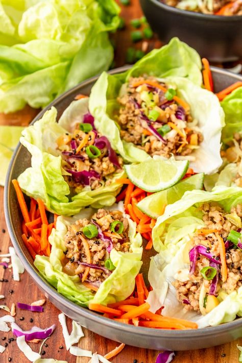 Easy Asian Ground Pork Lettuce Wraps -- this pork lettuce wraps recipe is a total crowd pleaser! Tender browned ground pork mixed with crunchy veggies and a tangy sweet & sour Asian sauce, all wrapped up in a cool and crisp bibb lettuce leaf, makes for a super satisfying meal in under 20 minutes. | ground pork lettuce cups | healthy pork lettuce wraps | low carb pork lettuce wraps #lettucewraps #pork #porkrecipes #porkrecipeshealthy #groundpork #lowcarb #lowcarbrecipes #asianrecipes #easyrecipe Asian Ground Pork, Ground Pork Lettuce Wraps, Healthy Pork Recipes, Lettuce Wraps Recipe, Asian Lettuce Wraps, Pork Wraps, Pork Lettuce Wraps, Ground Pork Recipes, Low Carb Pork