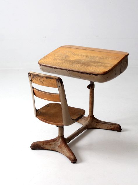 "This children's vintage classroom desk and chair set is perfect for your little one's play area or study space.  The swiveling chair and lift-top desk provide ergonomic and organized storage for toys, books, and art supplies. The metal frame and wood design is both stylish and durable. An American Chair Company branded desk.  CONDITION In good condition with wear consistent with age and use.  General finish wear. \"Hi\" carved into the wood desktop.  MEASUREMENTS Height:  26.25\"  ..  66.7 cm W Vintage Classroom, Vintage School Supplies, Storage For Toys, Old School Desks, Vintage School Desk, Books And Art, Kids Desks, Classroom Desk, Wood Nursery