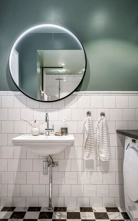 A half-tiled bathroom with a green painted upper half and a black-and white floor Half And Half Bathroom Wall, Tiled Half Bath, Half Tiled Bathroom Ideas, Bathroom With Tile Halfway Up Wall, Half Tile Wall Bathroom, Tile Half Way Up Bathroom Wall, Bathroom Half Tiles Half Paint, Half Tile Bathroom, Half Bath Tile Wall