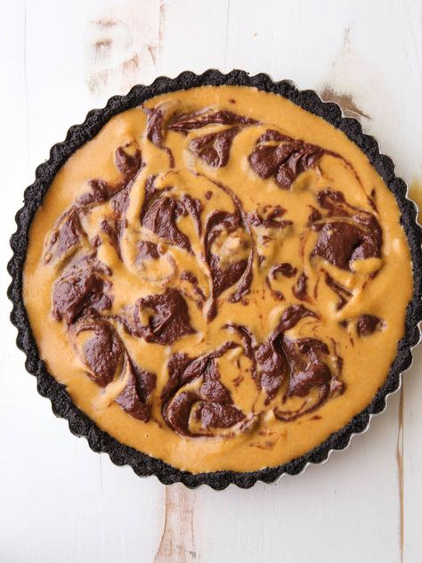 Chocolate Swirl Pumpkin Tart is perfect for the holidays! Holiday Tarts, Pumpkin Tart, Chocolate Cookie Crust, Completely Delicious, Pumpkin Tarts, Sweet Pies, Chocolate Pumpkin, Chocolate Swirl, Spiced Pumpkin