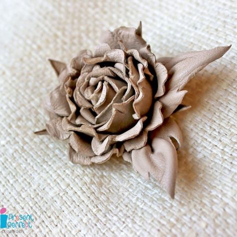 My leather rose tutorial for HATalk e-magazine - PresentPerfect Creations | Original hand crafted flower accessories in fine fabrics and genuine leather Silk Flowers Tutorial, Diy Leather Flowers, Leather Flower Tutorial, How To Make Leather, Fabric Feathers, Leather Rose, Rose Tutorial, Clover Flower, Present Perfect