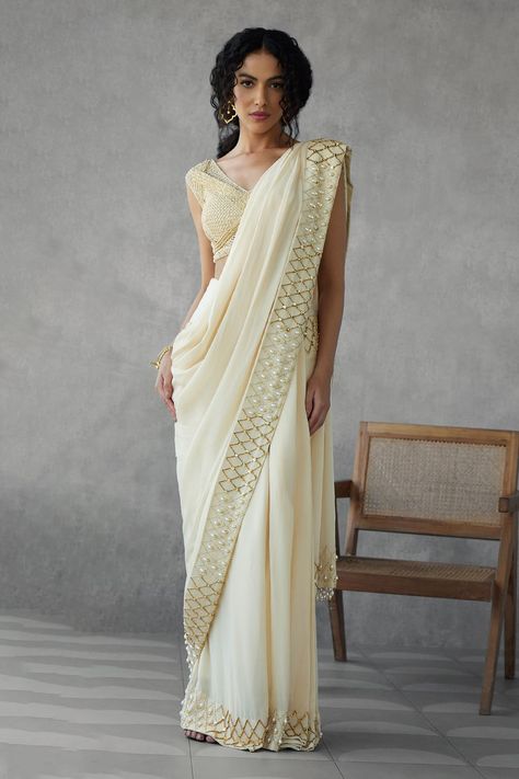 Shop for these amazing collections of Cream Saree: Georgette Sequin Pearl Border Embellished With Blouse For Women by Zamoraa The Label online at Aza Fashions. Shimmer Saree, Cream Saree, Embellished Saree, Pearl Border, Saree Georgette, Sequin Saree, Crepe Blouse, Padded Blouse, Pattern Embroidery