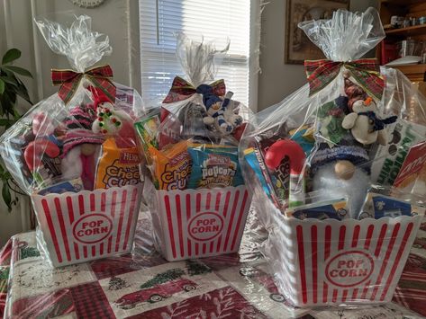 Movie Night In Gift Basket, Movie Night Popcorn Bucket, Popcorn Bucket Gift Ideas Christmas, Popcorn Tin Gift Ideas, Popcorn Basket Gift Ideas, Gnome Gift Basket, Movie Gift Basket Ideas, Popcorn Basket, Raffle Gift Basket Ideas