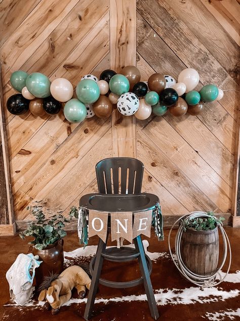 Wanted to share how we decorated for our son’s “first rodeo” party for his first birthday! Could totally go with “holy cow i’m one” theme as well! How The West Was One Centerpieces, First Birthday Themes Rodeo, Herd You Were One Birthday, Western Theme One Year Old Party, 1 Year Cowboy Birthday, Longhorn Birthday Party, Actually This Is My First Rodeo Birthday, Cowboys First Rodeo Birthday, How Cow Im One Birthday