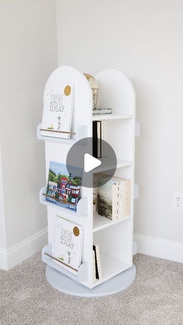 Zoe 🌿 DIY Furniture on Instagram: "Comment PLANS on this post and I'll send you the 🔗 to scoop up the printable plans for this DIY rotating bookshelf build as well as the blog post.  Both include the list of recommended tools and the full shopping list. The blog post is free to read and if you want to upgrade to the printable plans, they're on sale right now for $10!  This DIY rotating bookshelf is perfect for children's books and small toys or for novels. The shelves are deep enough that you can have two rows of chapter books so you can spin it around to reveal a whole new set of books! . . . . . #diybookshelf #diybookcase #rotatingbookcase #diyfurniture #buildfurniture #buildsomething #woodworkingprojectplans #diywoodworking #diywoodwork #woodworkforall #woodworkingplans_diy" Revolving Bookcase Diy, Lazy Susan Bookshelf, Spinning Bookshelf Diy, Diy Rotating Bookshelf, Diy Small Bookshelf, Kids Bookshelf Diy, Bookshelf Build, Diy Kids Bookshelf, Bookshelf Kids Room