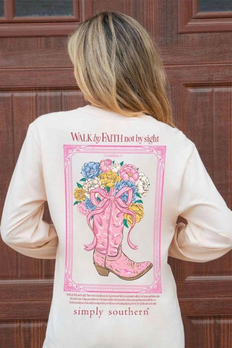 This Simply Southern Long Sleeve Walk By Faith T-Shirt for Women in Whisper is perfect for this Fall weather. This shirt features an adorable graphics, long sleeves, and lightweight construction. Features: Simply Southern Style: LS-WALK-WHISPER Color: Whisper 100% Cotton Simply Southern Shirts Long sleeves, crew neckline Simply Southern logo on sleeves, logo tag on hem Simply Southern logo and boot graphic on the left chest On the back: Country frame and boots with flowers and reads, “Walk by Faith not by sight” with a scripture verse above the Simply Southern logo Measurements from size small: Length from center back: 30” Chest: 38” Machine wash cold, tumble dry low Cute Christian Shirts, Southern Logo, Holding A Bouquet Of Flowers, Golden Poppy, Womens Christian Shirts, Uplifting Phrases, Color Whisper, By Faith Not By Sight, Jesus Clothes