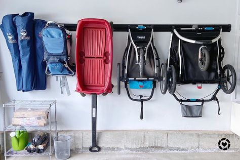 Ashley | DIY, Design & Staging on Instagram: “The garage and stroller storage rail system we used in our garage makeover!. . . .  Shop your screenshot of this pic with the LIKEtoKNOW.it…” Garage Organization Bikes, Garage Gym Ideas Layout, Storage Garage Organization, Garage Gym Flooring, Kid Organization, Garage Goals, Garage Gym Ideas, Sas Entree, Stone Villa