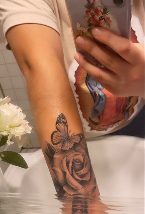 got this beautiful piece done on my forearm paired with a butterfly Butterfly Forearm Tattoo Women, Forearm Tats For Women, Butterfly Tattoo Forearm, Butterfly Forearm Tattoo, Baddie Tattoos, 2024 Tattoo, Rose Tattoo Forearm, Rose Tattoo Sleeve, Inner Forearm Tattoo