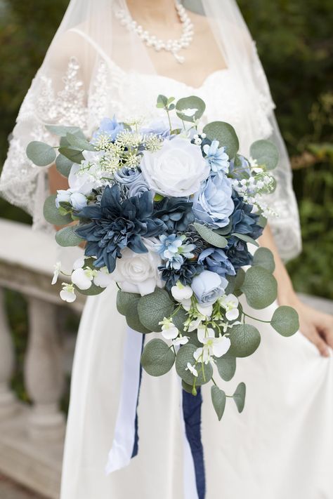 PRICES MAY VARY. Size: 17 inches high, 11 inches in diameter. Materials: The bridal bouquet is made of white rose, dusty blue roses, navy blue dahlia, gardenia, anemone, narcissus, dotted with eucalyptus and orchid. Gorgeous Dusty Blue Wedding Color Theme：Blue is always a pupular colour palette for wedding throughout the year. Our designer puts up together beautiful white, dusty blue, navy blue, grey and green colour palette for you.  It can create a stylish and fresh look or a more gorgeous and Dusty Blue Wedding With Gold, Dusty Blue And Sage Green Bridesmaid Bouquet, White Navy Wedding Theme, Boho Wedding Blue Color Palettes, Azure Blue Wedding Theme, Wedding Ideas Colours, Dusty Blue And Blush Bouquet, Dusty Blue And Sage Green Bridal Bouquet, Sage Green And Dusty Blue Bride Bouquet