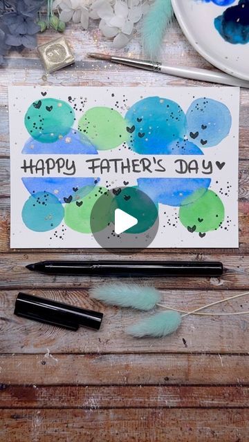 Ilona Regnery ✶ Lettering | Cards | Blends on Instagram: "HAPPY FATHERS DAY 💙💚🩵 Quick greeting card with watercolor circles.   Start by sticking tape to the center of the card. Paint some circles in different colors and sizes. Let them touch and overlap. It’s okay if the colors blend together. I used a medium flat brush, which allows you to paint nice, almost even circles. Once the paint is dry, add some confetti dots and a few small hearts with fineliners or stamps. If you want to add glittery accents, add some gold or silver glitter watercolor splatters on the card. Finally, carefully remove the tape and write the text.   I automatically chose the colors that my beloved father was once very fond of 🫶 What colors would you choose for this card?  Musik lizenzfrei: @richmlwd.music   Wer Watercolor Fathersday Card, Father’s Day Cards Painted, Father’s Day Watercolor Painting, Card For Father's Birthday, Father’s Day Card Ideas Cute, Watercolor Fathers Day Card Ideas, Fathers Day Watercolor Cards, Easy Fathers Day Cards, Diy Gifts For Dad Birthday