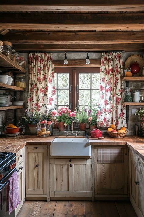 Black Kitchen Cabinets: A Guide to Stylish and Timeless Designs - Kitchen Informant Cottage Kitchen Black Countertop, Cozy English Cottage Kitchen, Cottagecore Kitchen Aesthetic, Cottage Core Kitchen, Cozy Cottage Kitchen, Cottagecore Kitchen, Whimsical Kitchen, Small Cottage Kitchen, Cottage Room