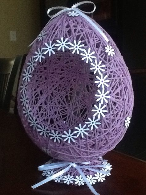 Yarn Easter egg basket. Beautiful and worth the time and effort it takes to make one of these. This is my own unique version as there are a lot of tutorials showing you how to do these. Easter Egg Basket Ideas, Polystyrene Eggs Craft, String Easter Eggs With Glue, Easter Egg Yarn Balloon, Twine Wrapped Easter Eggs, Crochet Egg Bunny, فن الرسم بالمسامير, Christmas Pebble Art, Easter Crafts For Adults