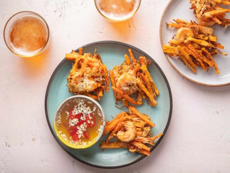 Crisp, juicy shrimp and vegetable fritters paired with a spiced vinegar for dipping. Ukoy Recipe, Bone Marrow Soup, Vegetable Fritters, Shrimp And Vegetables, Juicy Shrimp, Marinated Shrimp, Date Night Recipes, American Recipes, Cooked Carrots