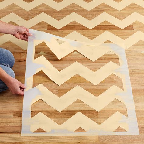 Add custom color and bold patterns to a wood or other hard-surface floor with dramatic chevrons you can stencil in a weekend. Chevron Stencil, Floor Stencils, Wood Floor Design, Royal Design Studio Stencil, Floor Designs, Stencil Painting On Walls, Painted Floor, Stenciled Floor, Easy Build