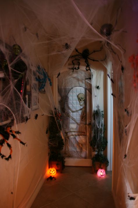 Hall way to bathroom. Spider webs and Spiders. Spider Ceiling Decoration, Halloween Spider Decorations Indoor, Scary Bathroom Halloween, Spiderweb Decorations Halloween Indoor, Spider Room Haunted House, Halloween Decorations Spider Webs, Fake Spider Web Decoration Indoor, Halloween Inside Decorations, Spider Web Decoration Indoor