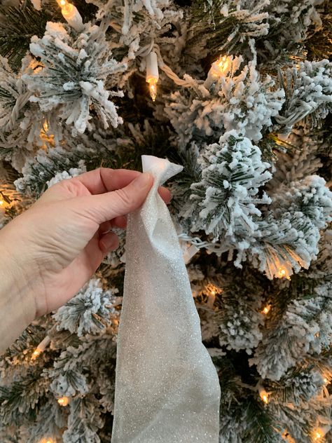 How to Add Ribbon to a Christmas Tree | Newport Lane How To Add Tulle To Christmas Tree, Christmas Tree Without Garland, Easy Christmas Tree Ribbon Ideas, Tulle In Christmas Tree, Ribbon Filler For Christmas Tree, Tree Filler Ideas Christmas, How To Add Ribbon To Christmas Tree, Tulle On Christmas Tree, How To Put Ribbon On A Christmas Tree Videos