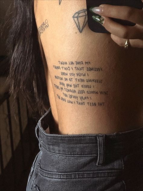 Tattoo in black and white on the rib from the lyrics of the song Valentine’s Day by the band LANY written by singer Paul Klein Paul Jason Klein Tattoos, Lany Tattoo Idea, Tattoos From Songs, Songs Tattoo, Written Tattoos, Tattoo Song, Evermore Tattoo, Tattoo Written, Birth Marks