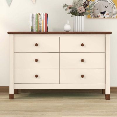 Organize your nighttime essentials with this dresser, featuring 6 drawers for clutter-free storage to save your space. The clean-lined design is built to last and given a relaxed, weathered finish. Modern cute style and versatility for many occasions, from large bedrooms to small apartments. Color: Cream/Walnut | Latitude Run® Atiksh 6 Drawer 47" W Double Dresser Wood in Brown | 30 H x 47 W x 17 D in | Wayfair Storage Dresser, Wooden Storage Cabinet, Wood Storage Cabinets, Kids Dressers, Dresser Storage, Brown Bedroom, Bedroom Furniture Dresser, Bedroom Dressers, Dressers And Chests