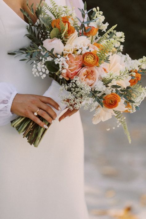 Bridal Bouquet Pop Of Color, Simple Fall Wedding Florals, Fall Floral Wedding Bouquets, Light Blue And Orange Wedding Bouquet, Peach And Orange Bouquet, Modern Fall Wedding Bouquet, White And Orange Wedding Bouquet, Bridal Fall Bouquet, Bridal Bouquet Orange And White