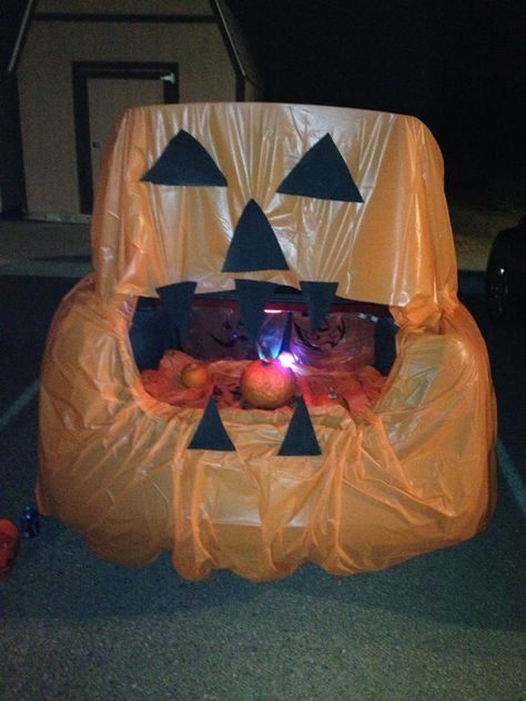 My very own Pumpkin trunk or treat!! Super easy with orange table cloths and cardboard I painted black. Did a ring toss with glow necklaces and the pumpkins inside. Candy prizes of course! Kids loved it!! October 28, 2012 @ Black Mountain Baptist Church -Kali Ezell Dollar Tree Trunk Or Treat Ideas, Halloween Car Decorations, Trunker Treat Ideas, Church Halloween, Trunk Or Treat Ideas, Orange Table, Treat Ideas, Trunk Or Treat, Pumpkin Theme