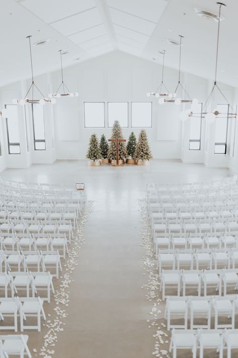 Indoor Christmas Wedding Ceremony, Christmas Tree Background Wedding, Wedding Cross Altar Christmas, Winter Wedding Entrance Decor, Christmas Tree Ceremony Backdrop, Christmas Ceremony Wedding, December Wedding Ceremony Decor, Winter Wedding Arch Indoor, White Christmas Wedding Ideas