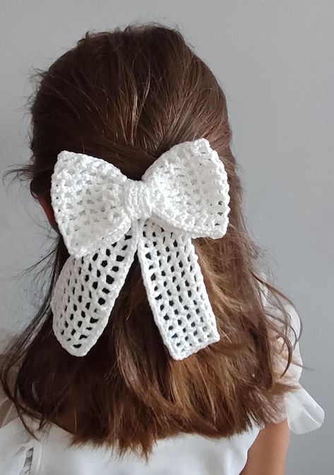 Elevate your style with our elegant crochet bow hair clips, perfect for both adults and kids. Handcrafted with attention to detail, these charming hair accessories combine the classic bow design with the soft texture of crochet, adding a touch of sophistication to any hairstyle. Whether you're dressing up for a special occasion or simply adding a bit of flair to your everyday look, these versatile hair clips are a timeless addition to any wardrobe. Available in a range of colors and sizes, they' Crochet Hair Bows, Kids Knitting, Accessories Elegant, Crochet Bow, Elegant Crochet, Hair Accessories Collection, Bow Hair Clip, Bow Hair Accessories, Eco Friendly Clothing