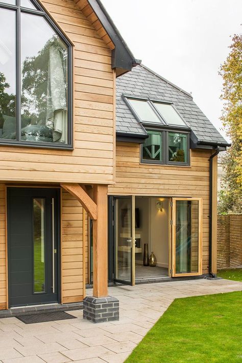 Contemporary home exterior with cedar timber cladding and grey windows and doors. Building your dream home with Potton Self Build Specialists.   #buildingahouseideas #houseideas #buildideas #pottonhome #selfbuild #countryhouse #dreamhouse #dreamhome #buildingahouse #buildingahome #timberframe #housedesign #architecture #modernhouse Cladding Front Of House, Cladded House Exterior, Timberframe Houses, Potton Homes, Cladding House Exterior, Horizontal Cladding, Weatherboard Cladding, Wood Cladding Exterior, Rendered Houses