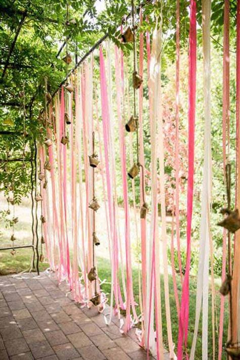 Having a patio or backyard is a fantastic feeling, especially on those warm summer days and cool evenings. However, some people may have the issue of ... | Hang a Magical Ribbon Screen Hiasan Perkahwinan, Ribbon Backdrop, Funny Vine, Oregon Wine Country, Rustic Wedding Decorations, Festival Bride, Garden Party Decorations, Garden Wedding Decorations, Wine Country Wedding