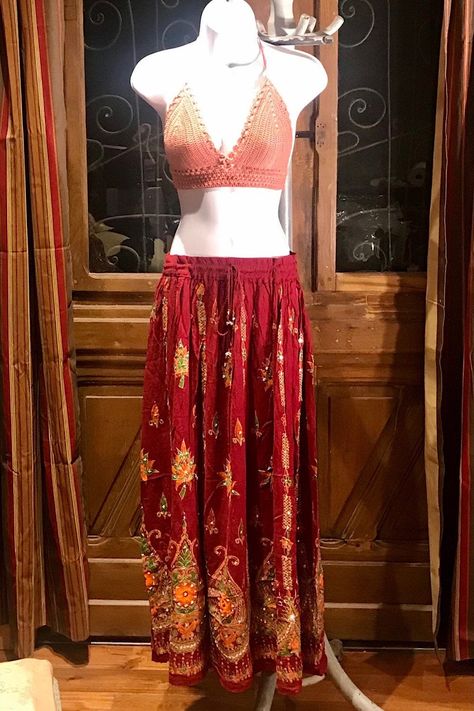 Sequined Embroidery Maroon Gold painted Long Maxi Skirt, Bohemian Boho Chic Festival Ethnic Hippie Summer Sparkle One Size Feminine Long Skirt. Crochet or tie dye top is not included. You will feel so good in this gorgeous skirt. Beautiful Long Maxi skirt hand embroidery, hand sequined gold painted and it sparkles so each skirt is unique and one of a kind. This rayon Maroon skirt is made using soft light and beautiful rayon fabric. Rayon was the first manufactured fiber. The term rayon was offic Bohemian Maxi Skirt, Maroon Skirt, Hippie Summer, Skirt Crochet, Long Maxi Skirt, Festival Pants, Boho Chic Dress, Embroidery Hand, Langer Rock