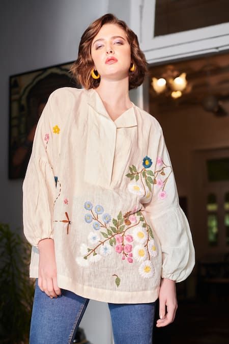 Buy Ivory Cotton Hand Embroidered Floral Flap Lila Top For Women by Nika 1.0 Online at Aza Fashions. Special Outfits, Floral Embroidered Shirt, Boxy Shirt, Embellished Shirt, Fashion Top Outfits, Dress Design Patterns, Ivory Tops, Pant Suit, Floral Tunic