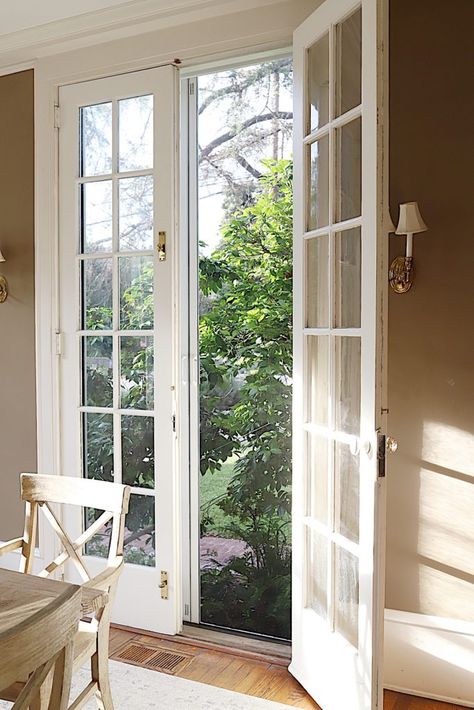 We haven't been able to leave our french doors open because we need screen doors. But that has all changed, thanks to my partnership with Phantom Screens. #summer #patio #my100yearoldhome #ad #sponsored Narrow French Doors, French Doors To Deck, Modern Door Design, Small French Doors, Bedroom French Doors, French Doors With Screens, French Doors Bedroom, Balcony Doors, French Doors Exterior