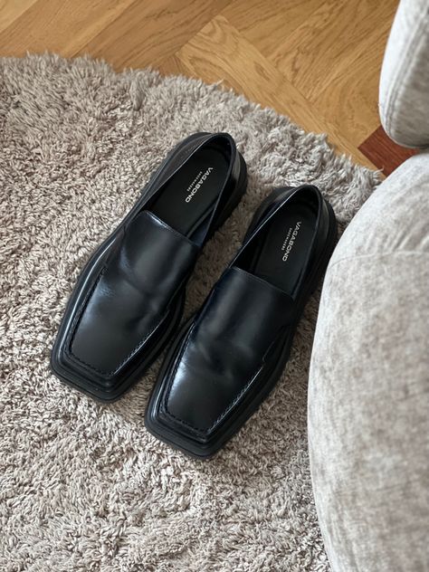 Black patent loafers