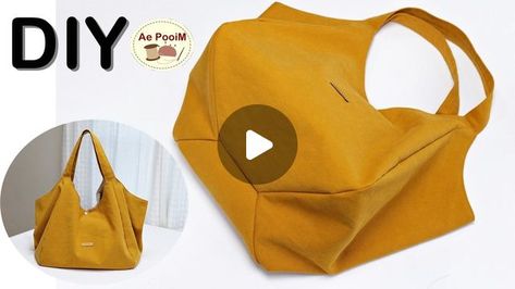 2,446 likes, 38 comments - ae_pooim on June 13, 2024: "This video will show you an easy way how to make a cute tote bag step by step and easy to understand. Material: Outer / Canvas (12 oz. thickness) - 46 x 34 cm (18 1/8" x 13 3/8") 4 pcs - 40 x 9 cm (15 3/4" x 9") 2 pcs Lining / Cotton - 46 x 34 cm (18 1/8" x 13 3/8") 4 pcs - 32 x 32 cm (12 1/2" x 12 1/2") 1 pc #diybags #bagtutorial #sewingprojects #fabricbags #sewingforbeginner #easysewingtutorial #sewingtips #bagpattern #shoppingbag #to Patron Tote Bag, Love Distance, Artisanats Denim, Tote Bag Diy, Handbag Tutorial, Totes Ideas, Sac Diy, Diy Tote, Suede Tote Bag