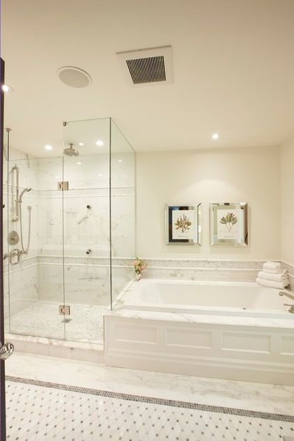 Mirrored frame artwork turns on the glam above this soaker tub for two. Master Bath With Separate Shower And Tub, Bathroom Ideas With Tub And Shower Separate, Drop In Tub Master Bath, Tub Shower Next To Each Other, Shower Tub Separate, Tub Beside Shower Master Bath, Bathroom Tub And Shower Separate, Built In Soaker Tub, Separate Bath And Shower Ideas