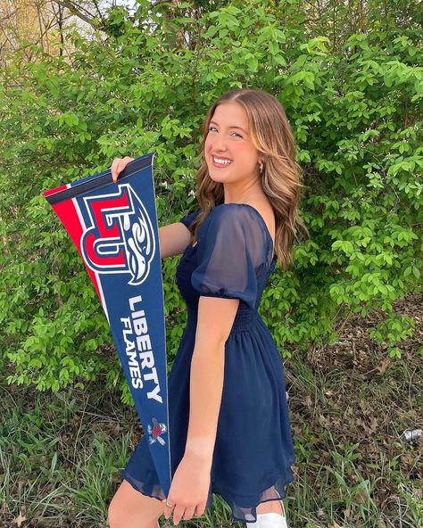 Senior Picture With College Shirt, Commitment Pictures College, Commited Pictures College, College Announcement Ideas Senior Pictures, Acceptance Letter College Pictures, College Announcement Photoshoot, Liberty University Outfits, Liberty University Graduation Pictures, Senior Picture Ideas College Shirt