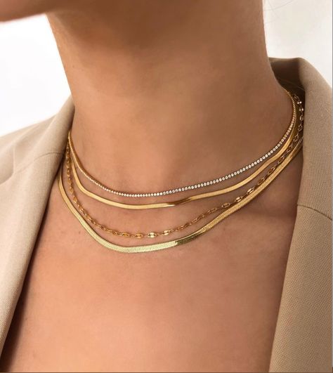 Dainty gold necklaces stacked to create a more polished look. #goldjewellery #goldnecklaces #necklacestack @shopccluxury Stacked Tennis Necklace, Necklaces Stacked, Necklace Gold Jewelry, Necklace Stack, Herringbone Chain, Stacked Necklaces, Snake Necklace, Luxury Necklace, Dainty Gold Necklace